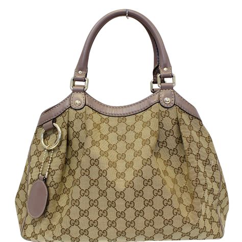 gucci stunning canvas logo small handbag|gucci handbags sukey medium tote.